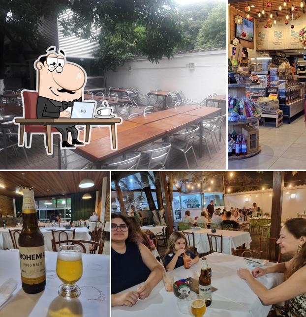 Sente em uma das mesas no Pizzaria & Restaurante Fazendinha