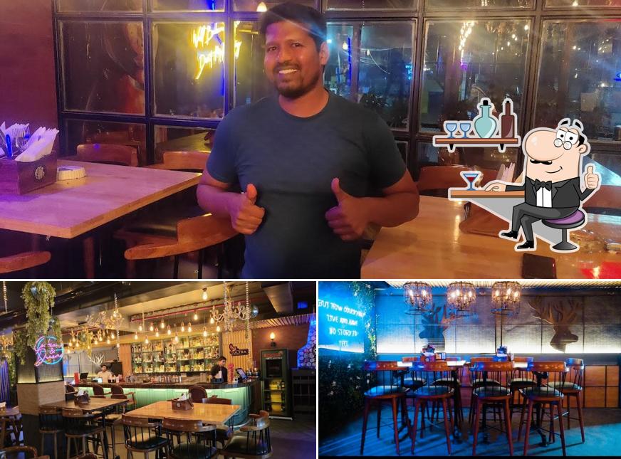 Take a seat at one of the tables at RAAG Kitchen and Pub