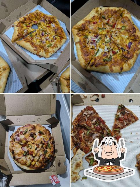 Pick pizza at Pizza Hut Landmark City, Kota