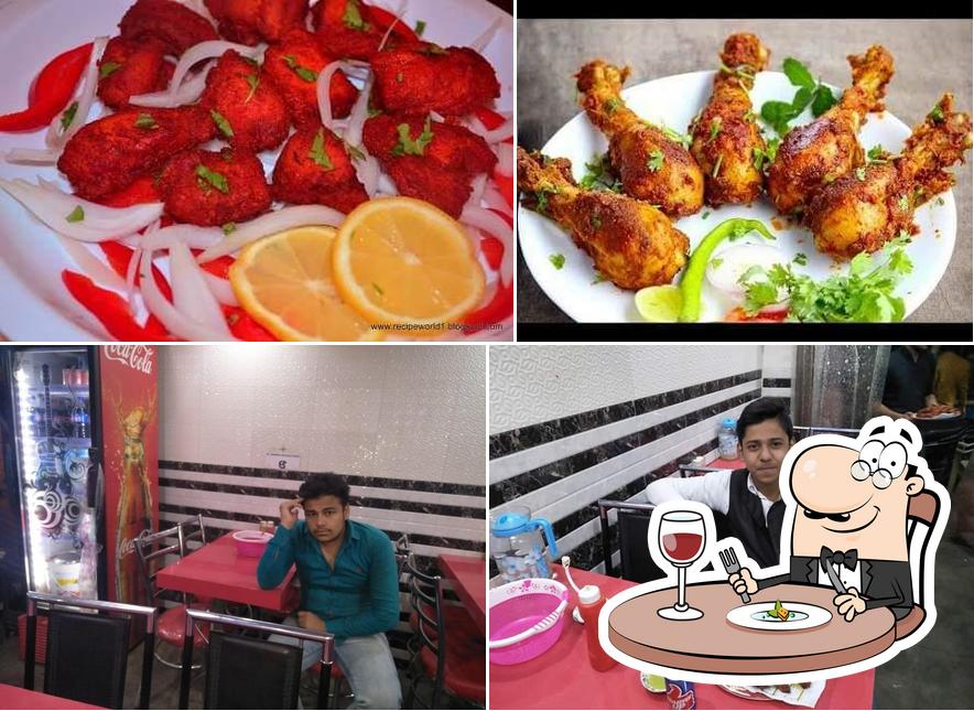 Check out the photo displaying food and interior at Al Madina Family Restaurant