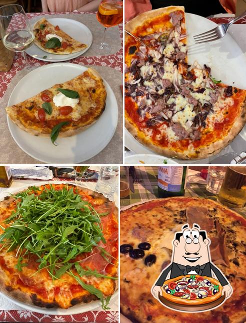 Prenditi una pizza a Pizzeria Ristorante Croda Cafè