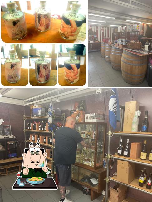 Tra le diverse cose da Enoteca Vineria PerBacco Bergamo si possono trovare la cibo e interni