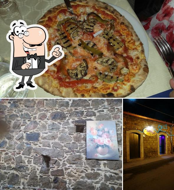 Guarda la immagine che presenta la esterno e pizza di Pizzeria DOC