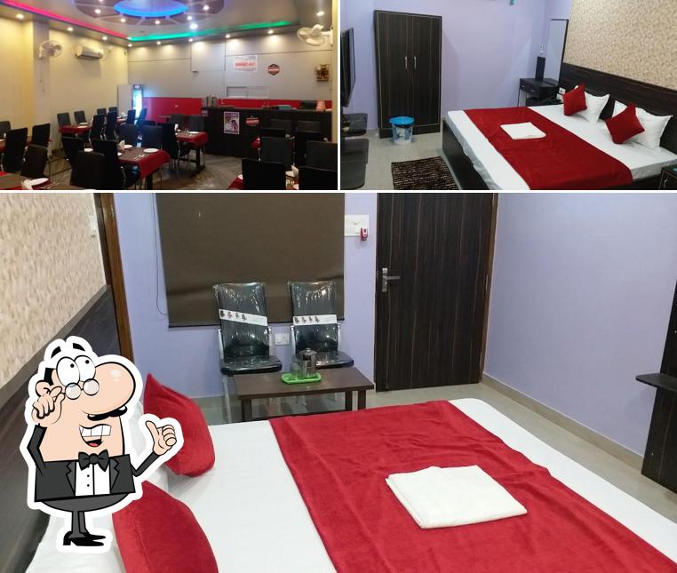 Take a seat at one of the tables at The Banarasi Kothi - Best restaurant the Banarasi Kothi Sweet Shop In Varanasi