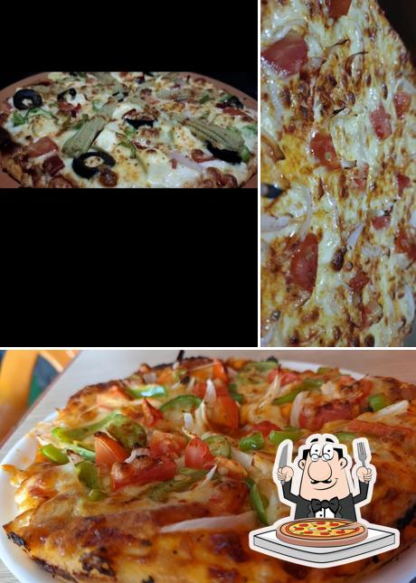 Get pizza at SAI PIZZA PALACE
