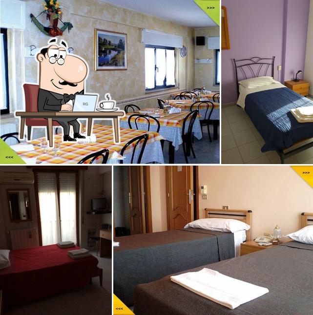 Siediti a un tavolo di Albergo Italia
