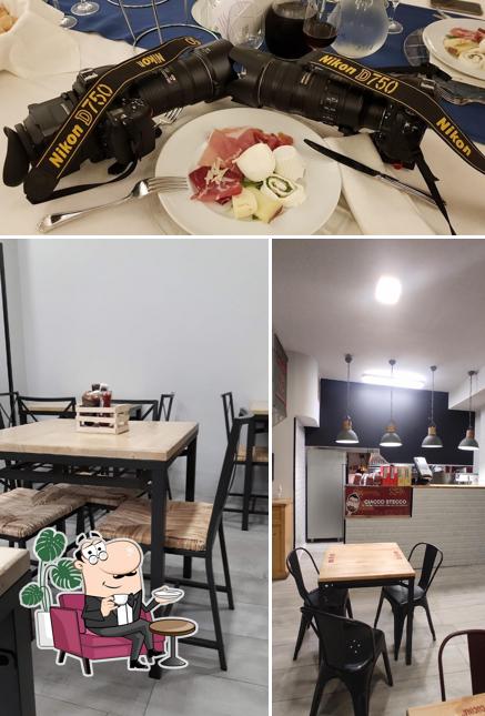 Guarda la foto che raffigura la interni e cibo di Ciacco Burger