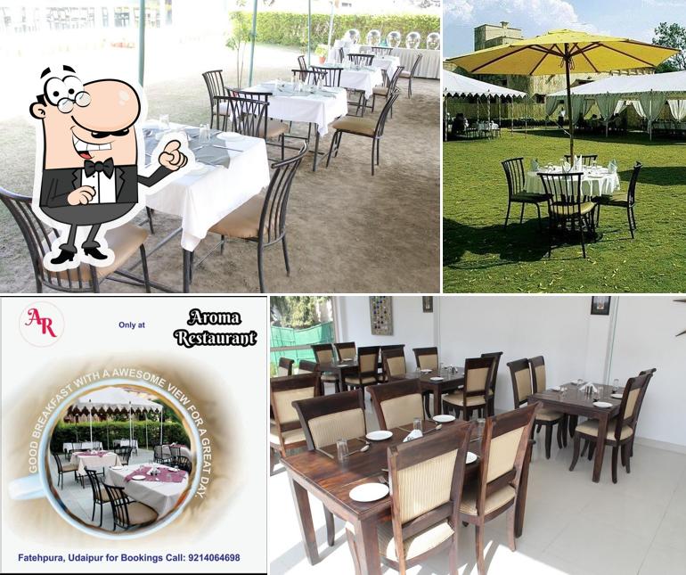 The interior of Restaurant Aroma - Veg & Non Veg Restaurant Udaipur, Multi Cuisine Restaurant in Udaipur, Laal Maas, Rajasthani Food