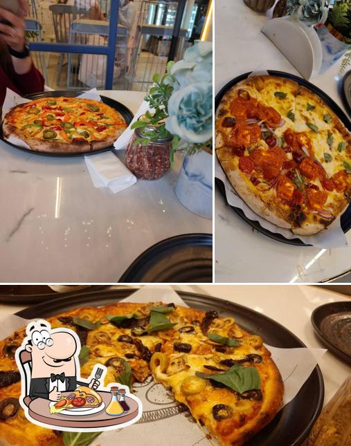 Get pizza at The Blue Oven