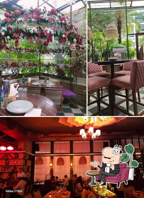 Take a seat at one of the tables at Kyma