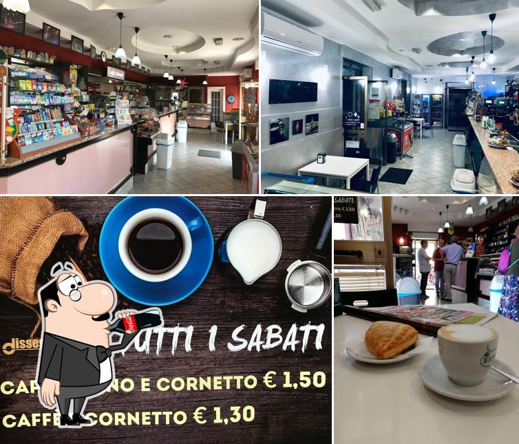 La immagine di bevanda e interni da Dissesto Café