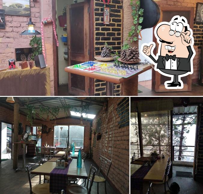 Take a look at the picture displaying interior and dining table at Elizz Food Block