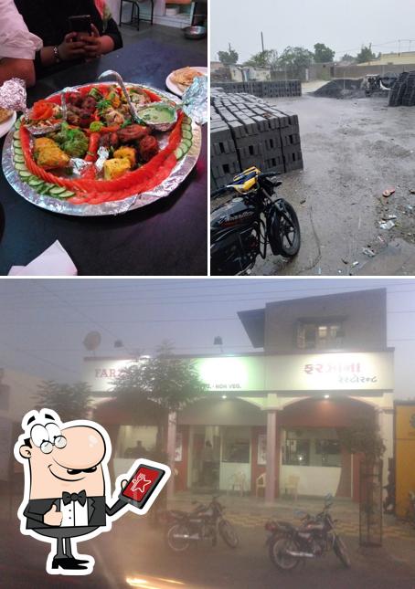 Among various things one can find exterior and dining table at Farzana Restaurant