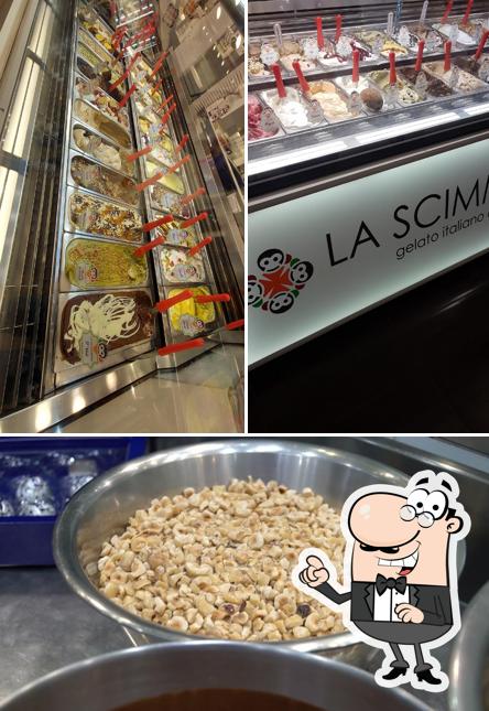 Questa è la immagine che mostra la interni e cibo di La Scimmietta