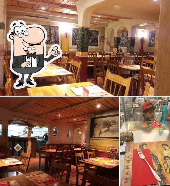 Siediti a un tavolo di Pizzeria Mamma Mia