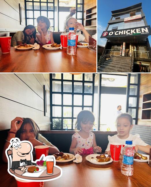 Among different things one can find dining table and exterior at O'Chicken Kharar