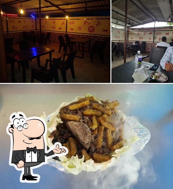 This is the photo displaying interior and food at Sai Dhaba