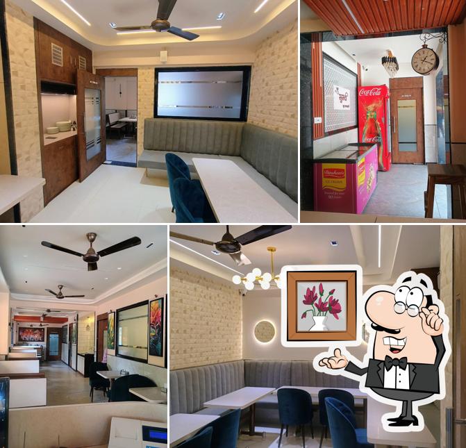 The interior of Hotel Gruh Suruchi Pure Veg Multi Cuisine Family Restaurant