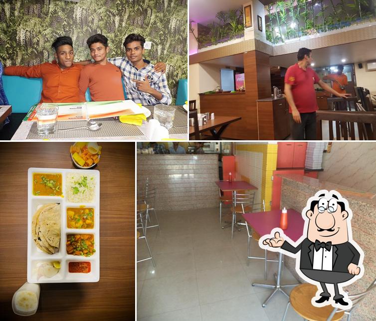 Take a seat at one of the tables at Ladli Fast Food