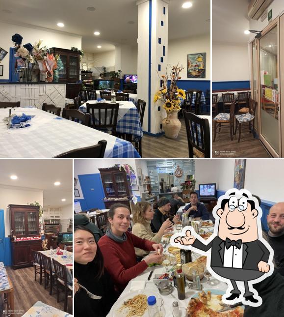 Dai un'occhiata agli interni di Pizzeria il Tagliere