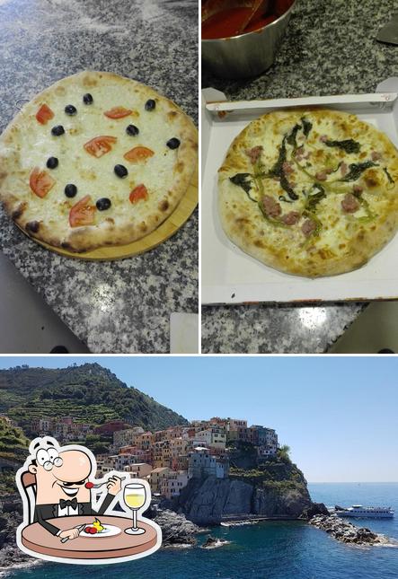La immagine di cibo e esterno da Pizzeria al Solito Posto Salsomaggiore Terme