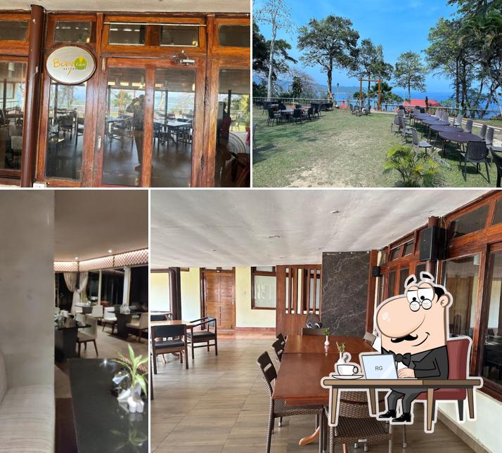 Take a seat at one of the tables at The Bayview Restaurant