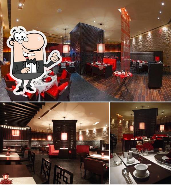 Take a seat at one of the tables at Red Pearl Restaurant