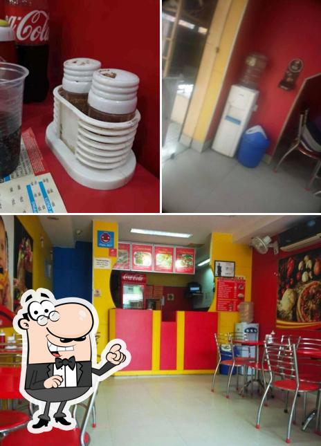 This is the image displaying interior and beverage at Pizza Diet
