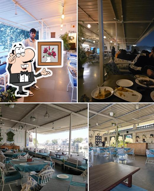 Take a seat at one of the tables at Lake Shore Hotel & Restaurant