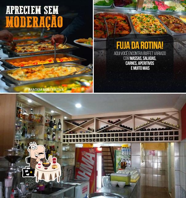 Esta é a foto mostrando comida e interior no Churrascaria M. Boi Mirim