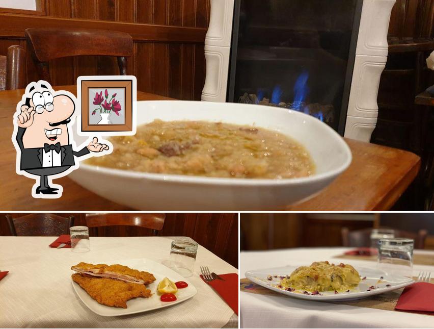 La immagine della interni e cibo di Trattoria Al Moro Trieste