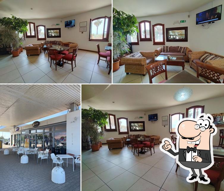 Siediti a un tavolo di Bar Tavola calda Island Services