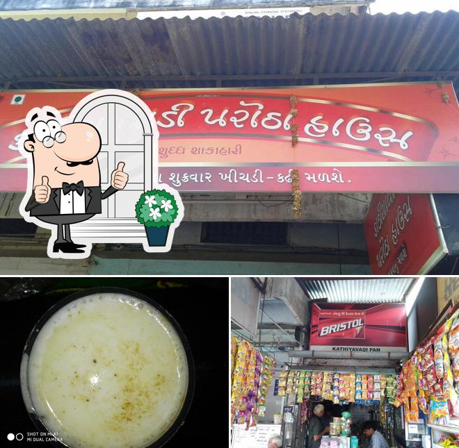 This is the picture showing exterior and beverage at Kathiyawadi Parotha House