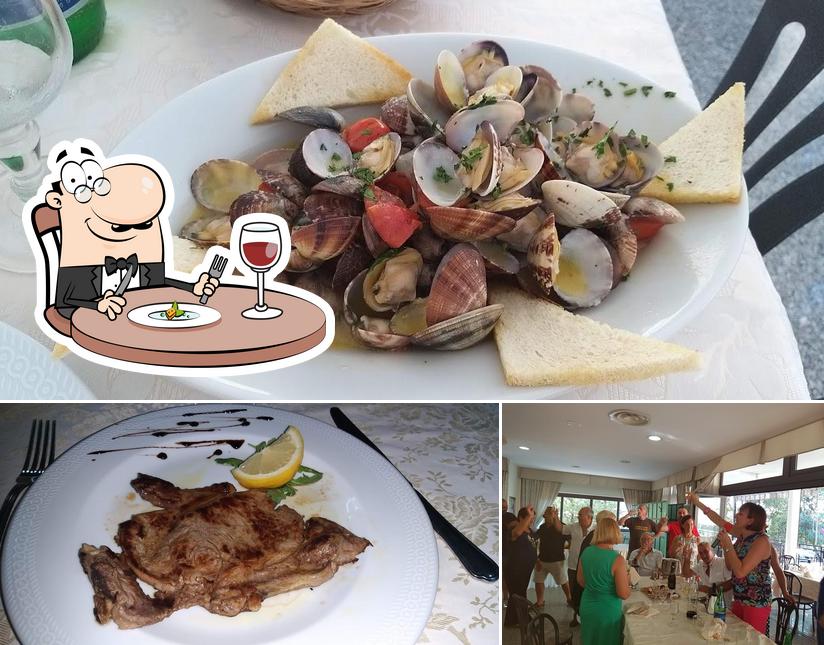 Questa è la foto che raffigura la cibo e interni di Ristorante Sala Ricevimenti Albergo A Capanna