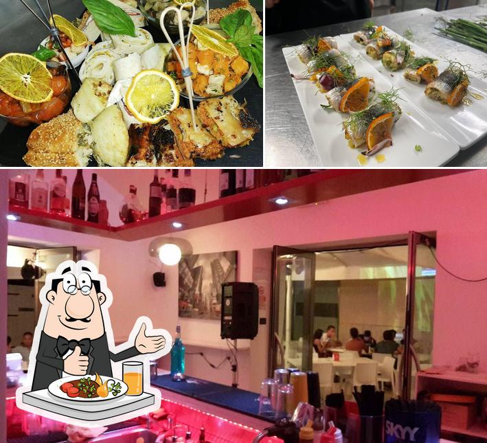 La foto di cibo e bancone da bar da Enjoy Sushi&Cucina