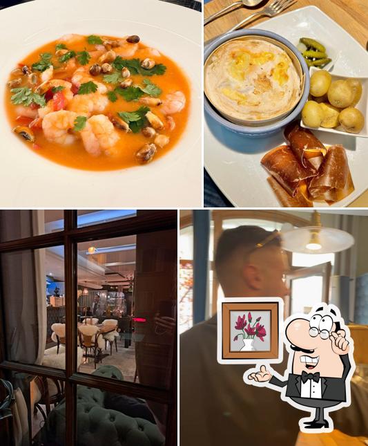 Questa è la foto che raffigura la interni e cibo di La Bise Restaurant