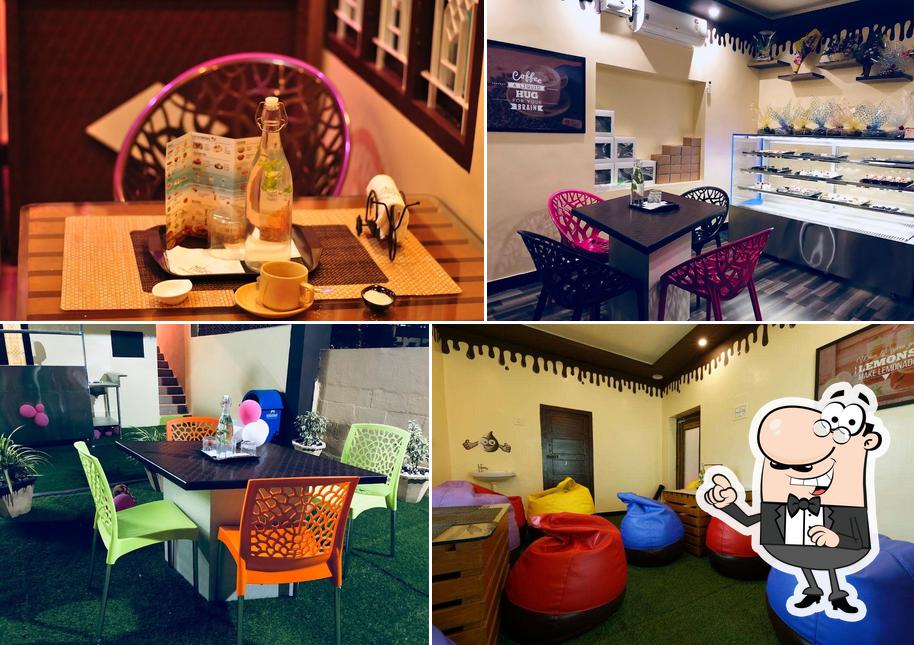 Take a seat at one of the tables at Nilas Cake