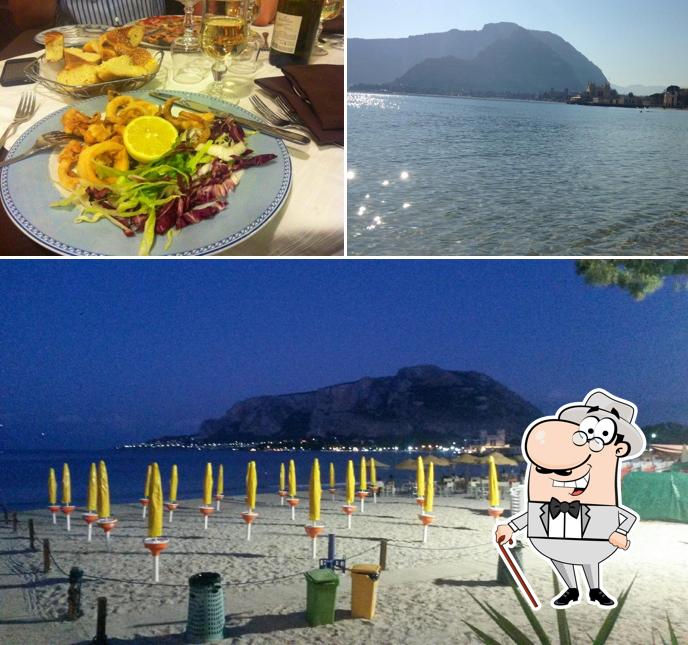 La foto della esterno e tavolo da pranzo di L'Ombelico Del Mondo