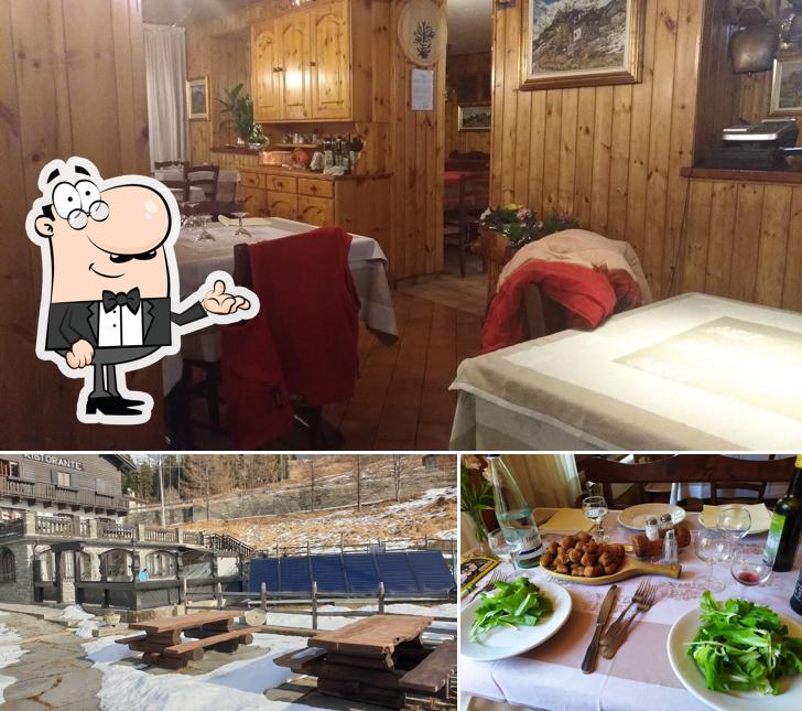 La immagine di interni e tavolo da pranzo da Ristorante Albergo Braciasco