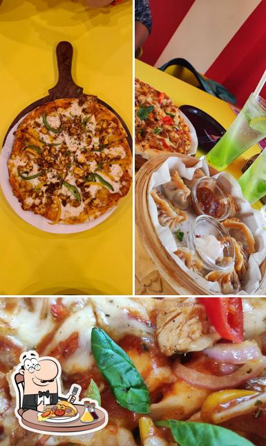 Try out pizza at Salt N Spice Restaurant