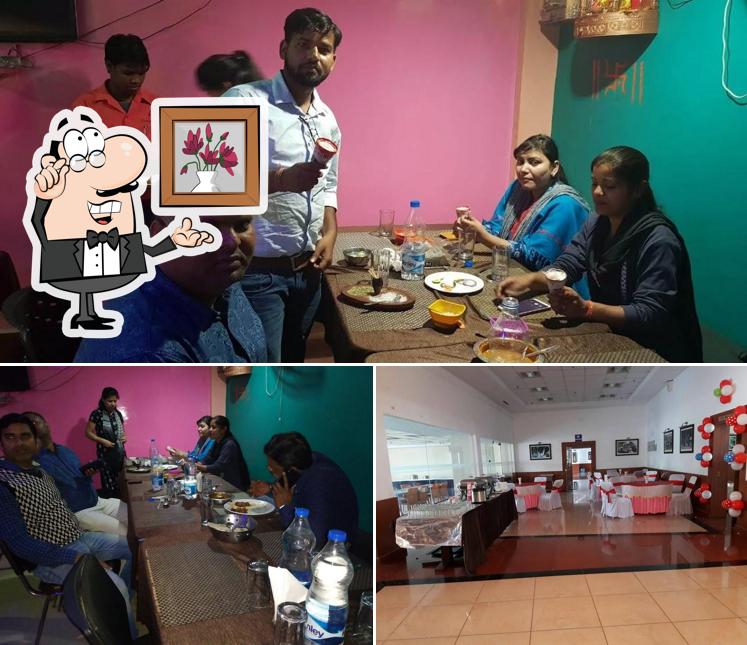 Take a seat at one of the tables at Samagra Restaurant