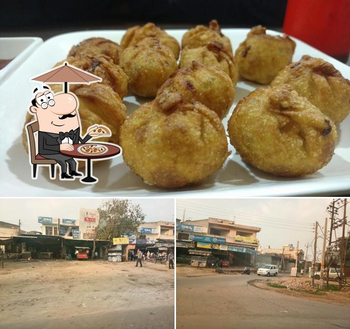 The picture of Aman Sweets & Restaurant’s exterior and food