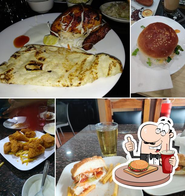 Get a burger at Cafe Qatar Restaurant