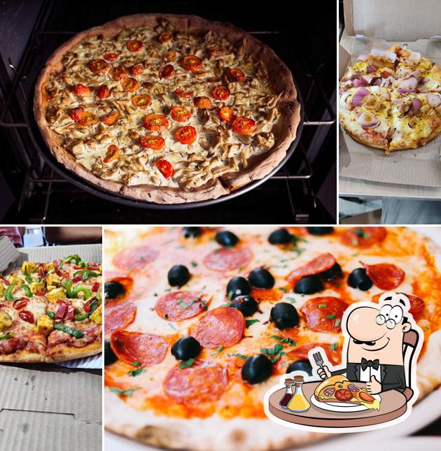 At Domino's Pizza Village Raysan, Gandhinagar, you can try pizza