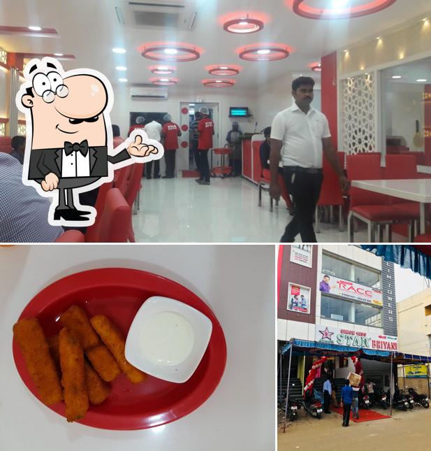 Take a seat at one of the tables at AMBUR STAR BRIYANI SINCE 1890