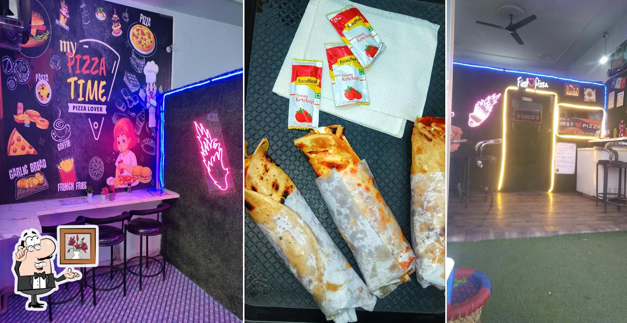 Take a seat at one of the tables at FIRST LOVE PIZZA