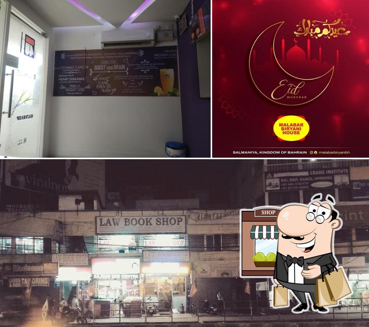Malabar Biriyani House is distinguished by exterior and blackboard