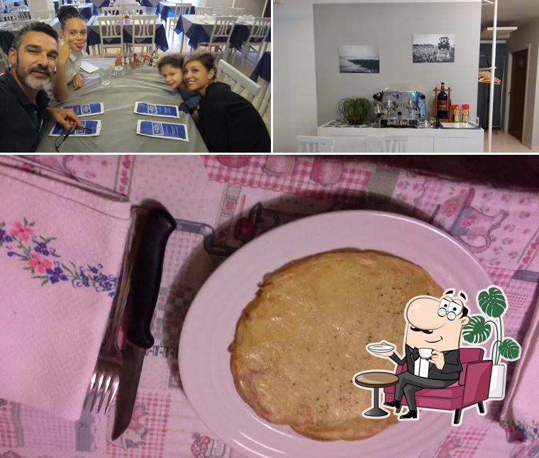 Questa è la immagine che mostra la interni e cibo di La Razdora