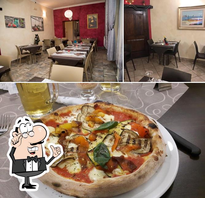 Dai un’occhiata alla foto che presenta la interni e pizza di Pizzeria Marciano