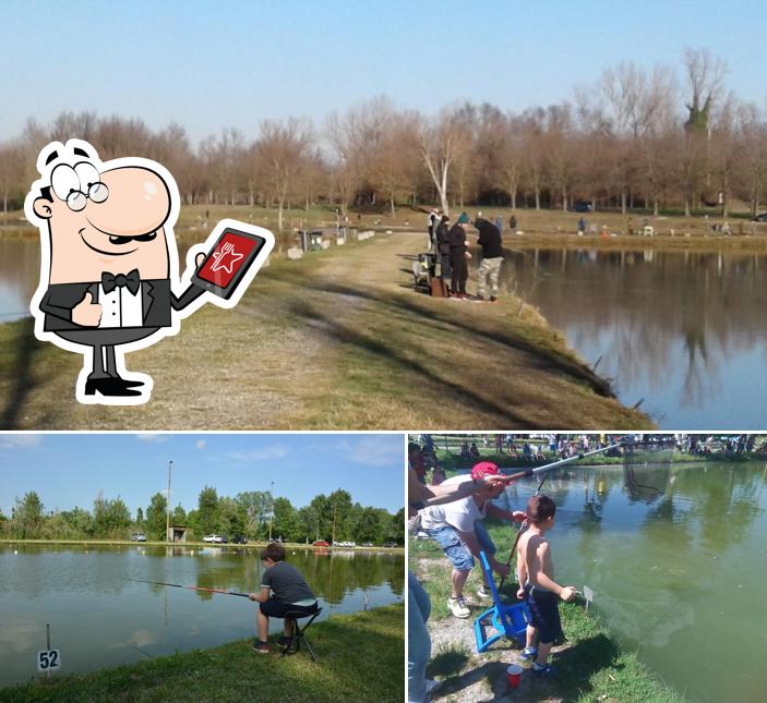Puoi goderti l'aria fresca da seduto all'esterno di Laghi Vivinatura